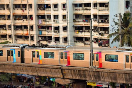 Photo for Metro train near Asalpha railway station, Mumbai, Maharashtra, India, Asia - Royalty Free Image