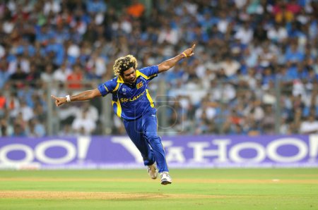 Photo for Sri Lankan bowler Lasith Malinga celebrate wicket of Indian batsman Sachin Tendulkar Not I Picture during the 2011 ICC World Cup Final between India and Sri Lanka at Wankhede Stadium on April 2 2011 in Mumbai India - Royalty Free Image