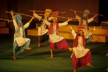 Photo for Men performing bhangra dance, folk dance, panjab, india - Royalty Free Image