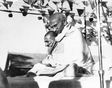 Photo for Mahatma Gandhi and Khan Abdul Gaffar Khan at a public meeting during Mahatma Gandhis visit of the North West Frontier Provinces , October 1938 - Royalty Free Image