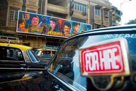 Photo for Taxis for hire in front of Alfred cinema, Grant road, Bombay Mumbai, Maharashtra, India - Royalty Free Image