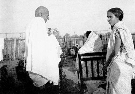 Photo for Mahatma Gandhi with Madhuri Khare and Jankidevi Bajaj during her fast at Sevagram Ashram, 1941 - Royalty Free Image