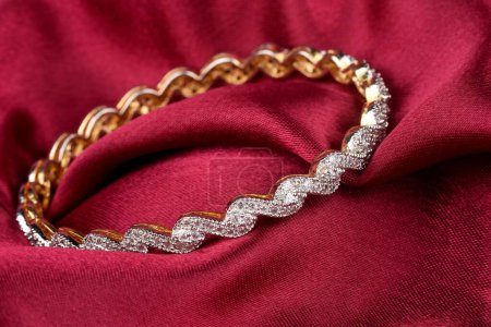Photo for Diamond bracelet on cloth, diamond jewellery, diamond bangles, diamond jewelry - Royalty Free Image