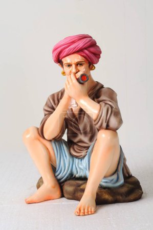 Figurine en argile, statue d'homme rajasthani fumant du piment