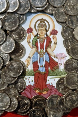 Goddess Lakshmi and One rupees Coins