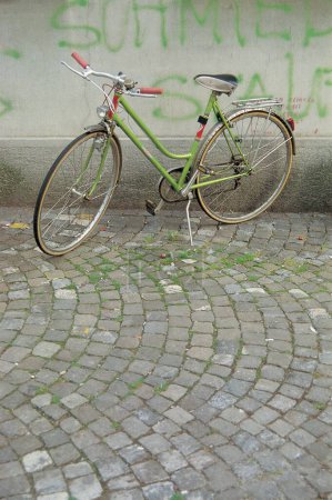 Photo for Bicycle at graffiti on wall ; Wales; Britain; UK United Kingdom England - Royalty Free Image