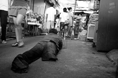 Photo for Lame man at market place, bangkok, thailand - Royalty Free Image