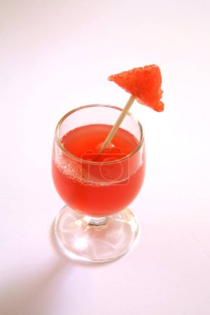 Photo for Drinks ; juice with stick of watermelon piece in glass on white background - Royalty Free Image
