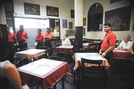 Photo for Leopold Cafe waiters, after terrorist attack by Deccan Mujahideen on 26th November 2008 in Bombay Mumbai, Maharashtra, India - Royalty Free Image