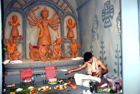 Photo for Durga clay model killing demon mahishasura with statues of kartikeya ganesha and lakshmi saraswati on Durga puja - Royalty Free Image