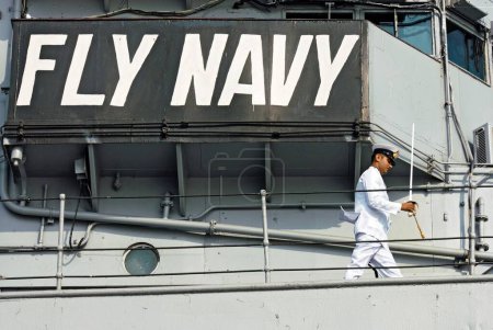 Photo for Fly navy slogan written on INS viraat R22 indian navy, Bombay, Mumbai, Maharashtra, India - Royalty Free Image
