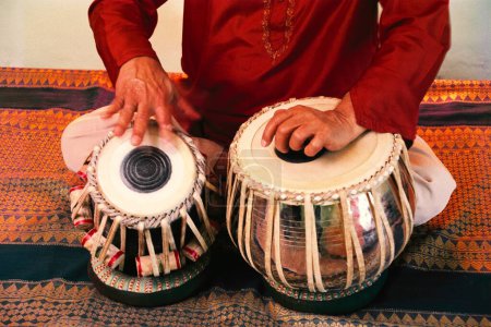 Photo for Man playing musical instrument tabla India - Royalty Free Image