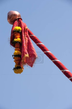 Photo for Gudi raised for celebrating gudi padva festival ; Thane ; Maharashtra ; India 2010 - Royalty Free Image