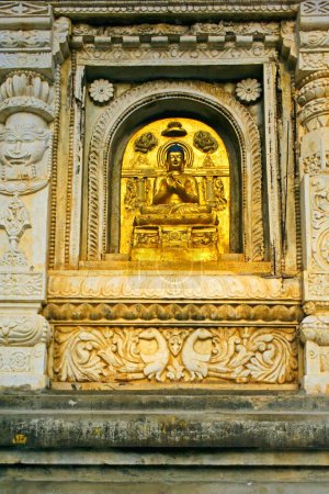Photo for Statue of Gautam Buddha ; UNESCO World Heritage Mahabodhi temple ; Bodhgaya ; Bihar ; India - Royalty Free Image