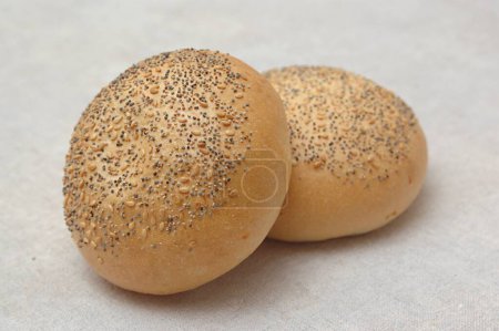 Photo for Food , two Rosen bread (bread topped with onion seeds and sesame seeds) Bakery - Royalty Free Image