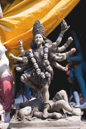 Photo for Clay statue of goddess kali ; Kumartuli ; Calcutta Kolkata ; West Bengal ; India 14-October-2009 - Royalty Free Image
