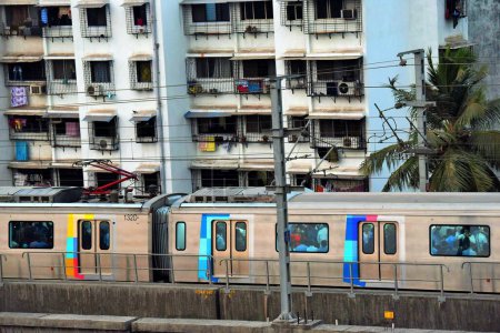Photo for Metro train near Asalpha railway station, Mumbai, Maharashtra, India, Asia - Royalty Free Image