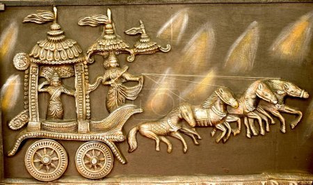 Terracotta panel of Mahabharata battle where lord Krishna and Arjuna are in the chariot , India