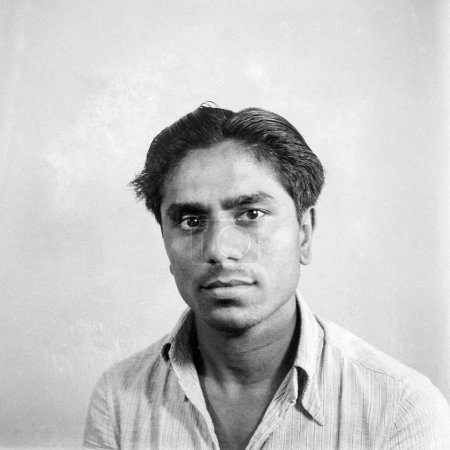 Photo for Old vintage 1900s black and white picture studio portrait Indian man wearing shirt India - Royalty Free Image