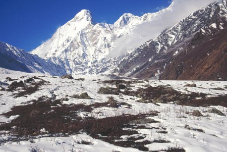 Photo for Mountain Nandadevi East , Base Camp , 7434 meter , Nandadevi peak right-7816 meter as seen from Pachhu Glacier , Uttaranchal , India - Royalty Free Image