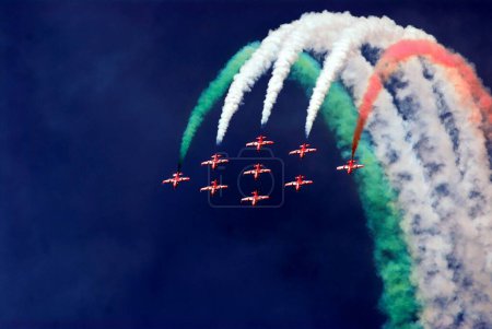 Photo for Air show acrobatic of Suryakiran team of IAF at Shanghumugom beach ; Trivandrum ; Kerala ; India - Royalty Free Image