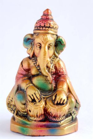 Photo for Colourful statue of lord Ganesha elephant headed god playing tabla , India - Royalty Free Image