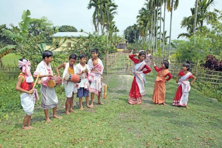 Photo for Children celebrating Bihu festival (new year celebration) Assam, India - Royalty Free Image