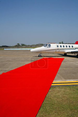 Photo for Red carpet for passengers of inaugural flight at aamby valley airport, Lonavala, Maharashtra, India - Royalty Free Image