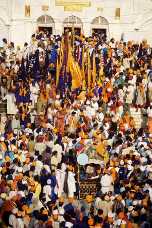 Photo for Sikh devotees congregate at the Sachkhand Saheb Gurudwara for 300th year of Consecration of perpetual Guru Granth Sahib on 30th October 2008, Nanded, Maharashtra, India - Royalty Free Image