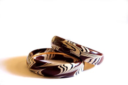 Photo for Colourful wooden bangles on white background - Royalty Free Image
