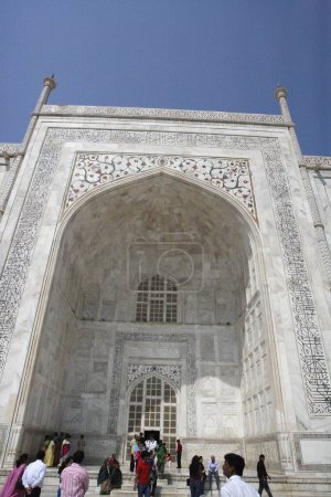 Photo for Huge arch of Taj Mahal Seventh Wonders of World on the south bank of Yamuna river , Agra , Uttar Pradesh , India UNESCO World Heritage Site - Royalty Free Image