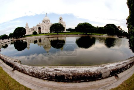 Photo for Reflection of Victoria Memorial in the water pool ; Calcutta ; West Bengal ; India - Royalty Free Image
