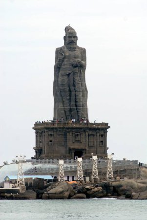 Photo for Adjacent to Swami Vivekananda memorial stand 133ft statue of Thiruvalluvar honoured Tamil poet ; Kanyakumari ; Tamil Nadu ; India - Royalty Free Image