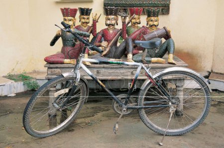 Photo for Bicycle at musicians statues, Udaipur; Rajasthan, India - Royalty Free Image