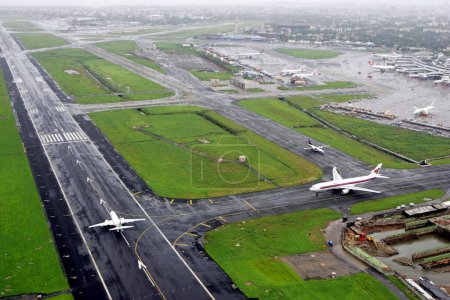 Photo for An aerial view runways and aircrafts at the Mumbais Chhatrapati Shivaji Maharaj International airport at Sahar ; Bombay Mumbai ; Maharashtra ; India - Royalty Free Image