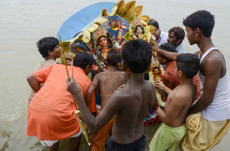 Photo for Goddess durga idol immersion at Hooghly river, Kolkata, West Bengal, India, Asia - Royalty Free Image