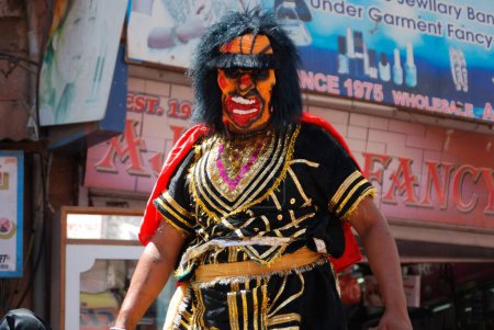 Photo for Man as demon costumes in Mahaveer Jayanti procession, Jodhpur, Rajasthan, India - Royalty Free Image