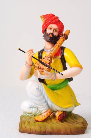 Photo for Clay figurine , statue of rajasthani musician playing sarangi - Royalty Free Image