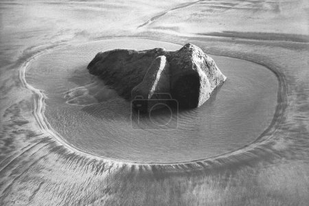 Photo for Rock on sand ; Porbandar area of Gujarat ; India - Royalty Free Image