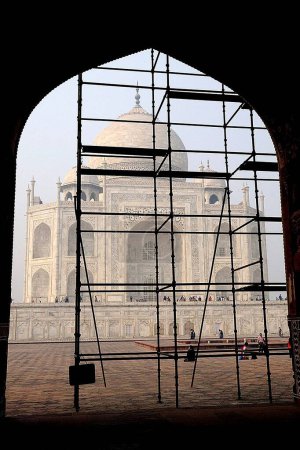 Photo for Taj Mahal from arch of guesthouse mehman khana ; Agra ; Uttar Pradesh ; India - Royalty Free Image