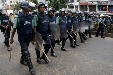 Photo for Bangladesh Police Marching on street on Band Day, Dhaka, Bangladesh - Royalty Free Image