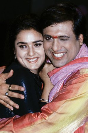 Photo for Preity Zinta and Govinda embracing, India, Asia - Royalty Free Image
