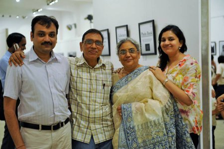 Photo for Family at Jagdish Agarwal photography exhibition, Jehangir Art Gallery, Mumbai, Maharashtra, India, Asia - Royalty Free Image
