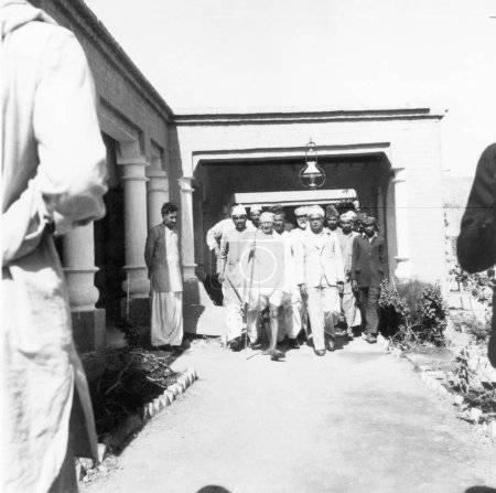 Photo for Mahatma Gandhi and others walking at Kahot Peshawar, October 1938 - Royalty Free Image