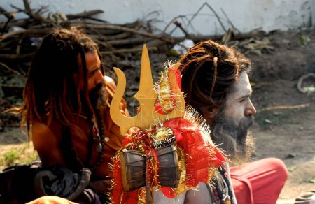 Photo for Naga Sadhu and his chela disciple - Royalty Free Image