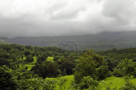 landscape in monsoon with rain clouds looming Raigad Maharashtra India Asia