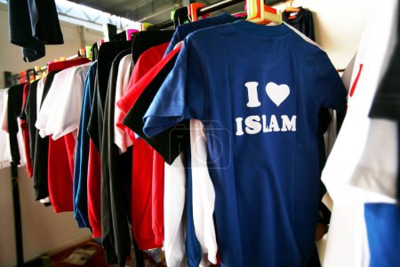 Photo for T-shirt exhibiting love for Islam at the International Islamic Conference and Exhibition held at Somaiya grounds in Bombay now Mumbai, Maharashtra, India - Royalty Free Image