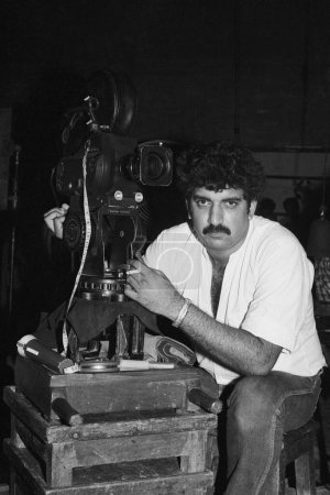 Photo for Indian old vintage 1980s black and white bollywood cinema hindi movie film actor, India, Baba Azmi, Indian film cinematographer - Royalty Free Image