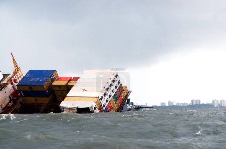 Photo for Container ship chitra tilted dangerously colliding in sea ; Bombay Mumbai ; Maharashtra ; India 9-August-2010 - Royalty Free Image