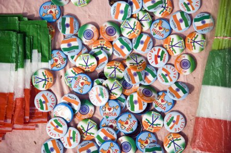 Photo for Anna Hazare Supporters selling indian flag badges tag at ramlila maidan new delhi India Asia - Royalty Free Image